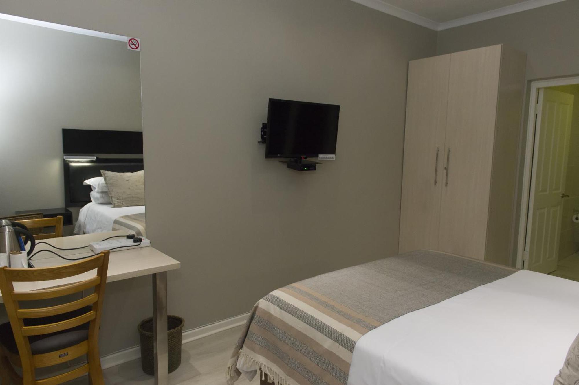 The Suburban Guest House ブルームフォンテーン 部屋 写真